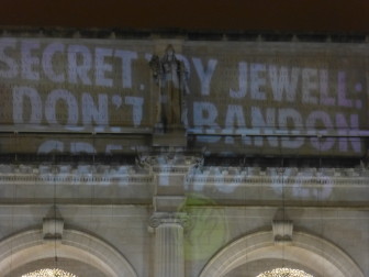 "Secretary Jewell: Don't Abandon Gray Wolves" projected onto Union Station in Washington, DC