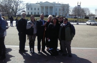 Great Lakes wolf advocates in front of the White House.